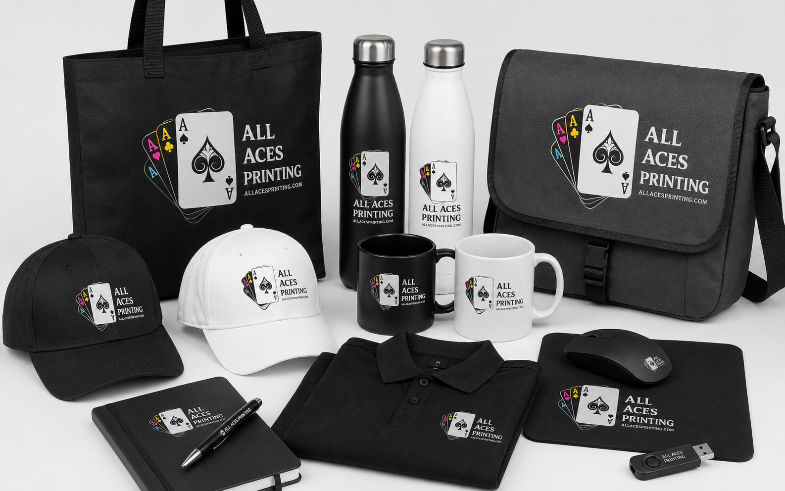 Collection of branded promotional merchandise including caps, bottles, bags and mugs